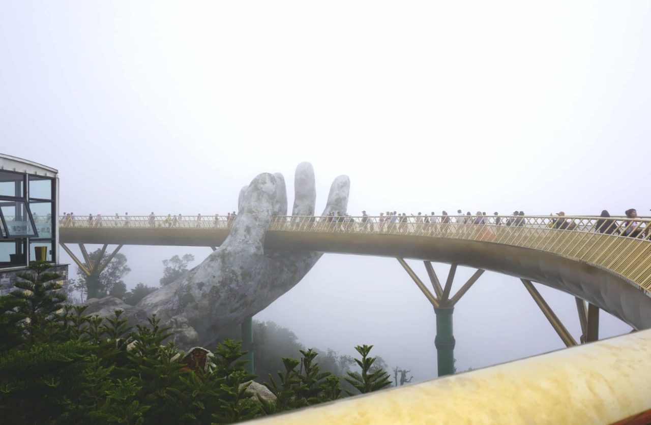 Golden bridge in the fog