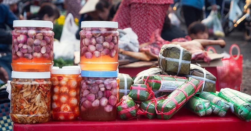 Traditional “Li Xi” Custom - Giving Luckey Money on Tet in Vietnam